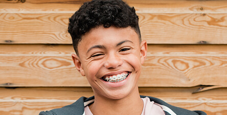 smiling boy with braces